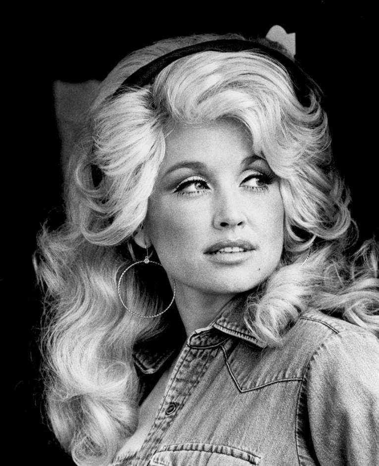 Young Dolly Parton, country music legend known for her warm, personal sense of home and Tennessee roots